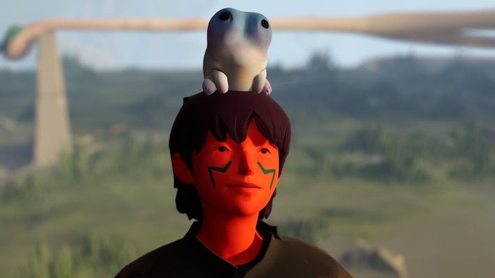 The protagonist of the climbing game "Jusant," a person with short brown hair and blue tattoos on each cheek. Atop their head sits a blue-and-white blog character with black eyes.