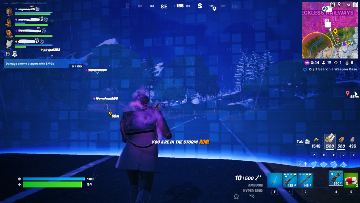 Alan Wake in Fortnite, running toward the wall of the game's storm, a blue boundary with squares. Text on screen reads "You are in the storm RUN"