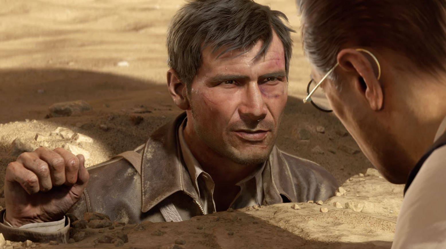Indiana Jones in video game Indiana Jones and the Great Circle:" a white man with brown hair buried up to his shoulders in sand