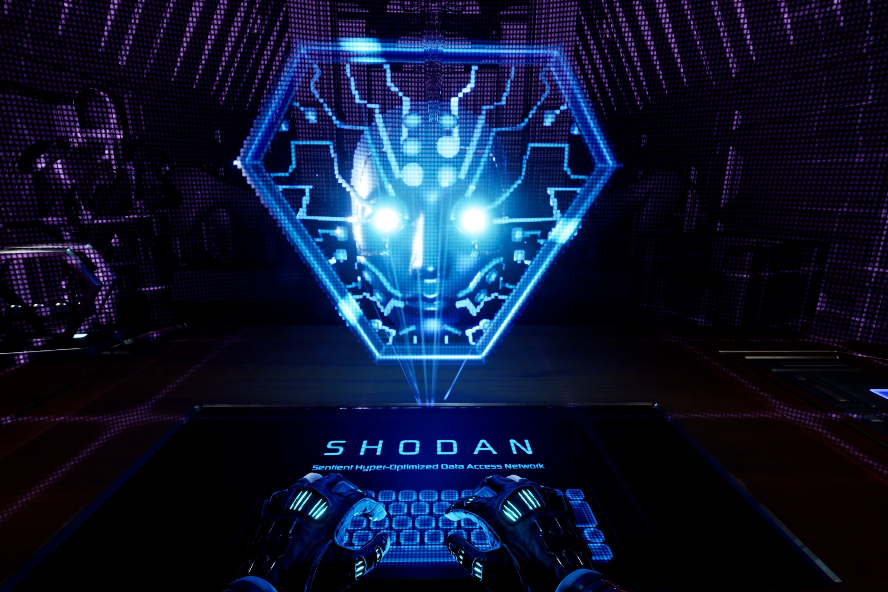 a screenshot from the system shock remake showing hands at a keyboard and SHODAN