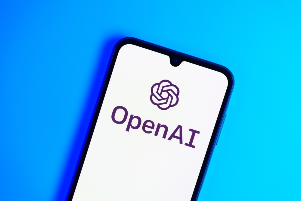 The words OpenAI on a cell phone