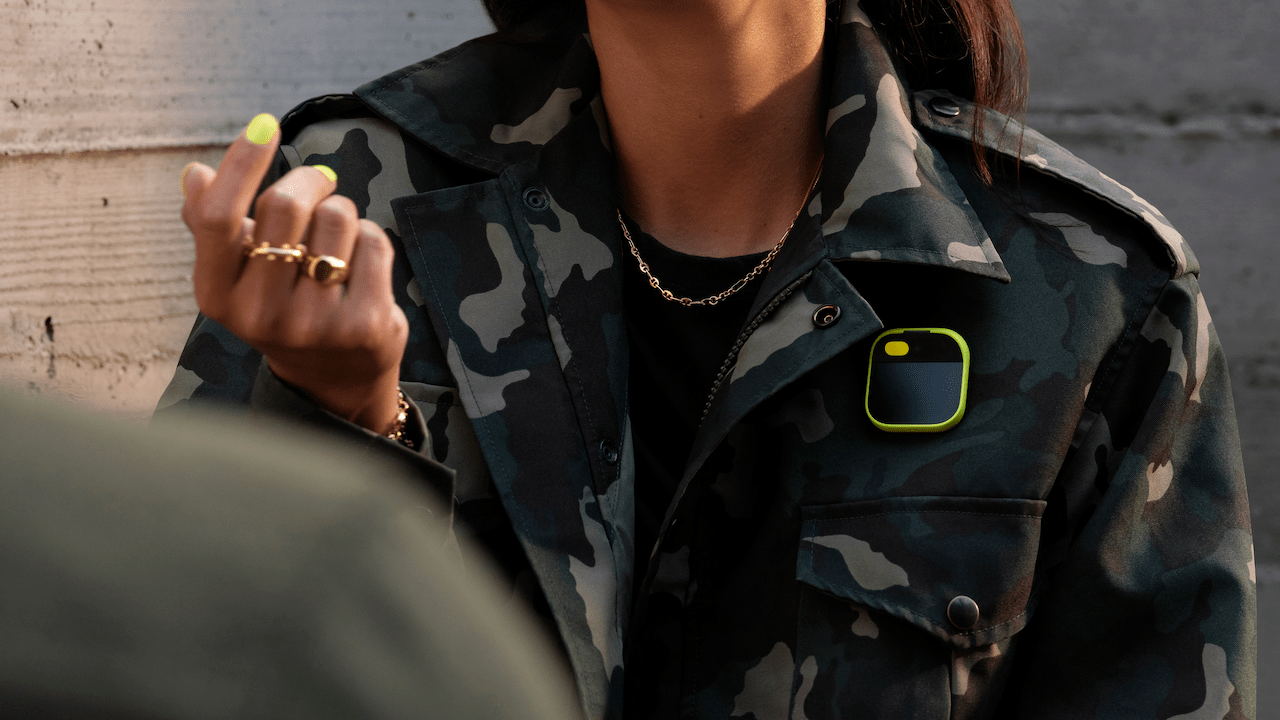 The Humane AI pin on a user's jacket