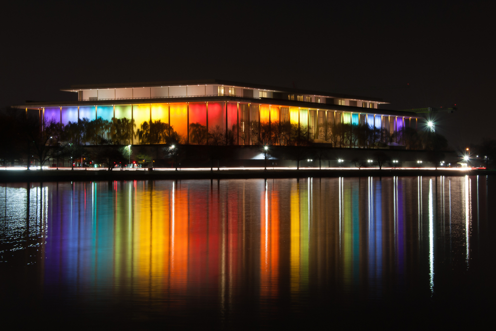 the kennedy center lit up in rainbow colors