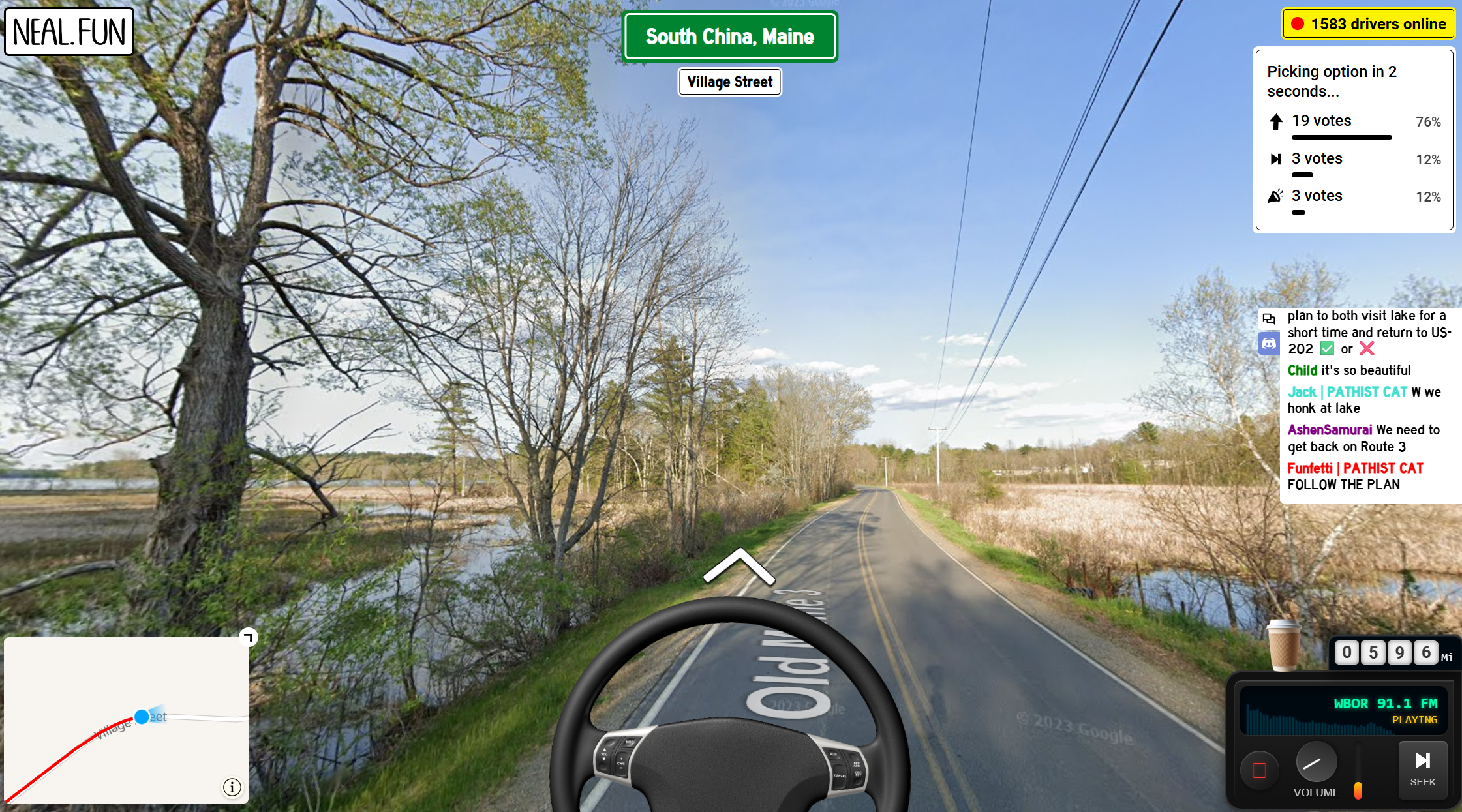 Screenshot of neal.fun's Internet Roadtrip, showing a road by a lake. There's a steering wheel and a chat.