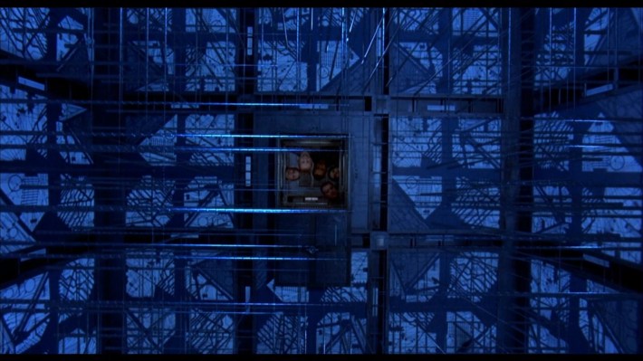 Characters looking at needle trap in Cube.