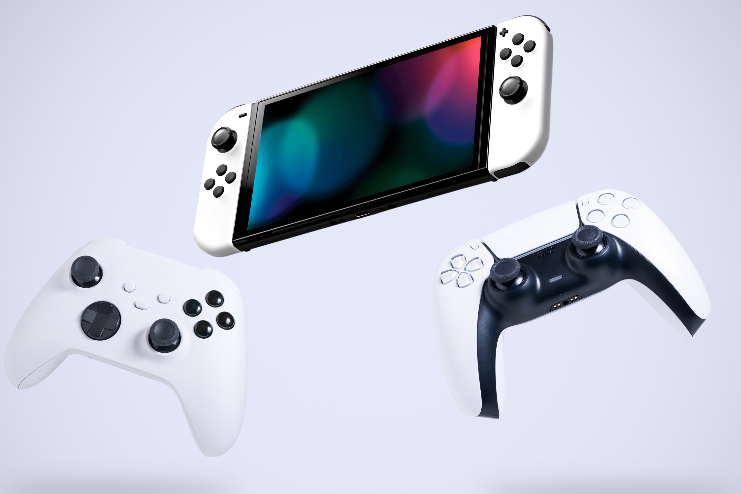Next Generation game controllers on white background