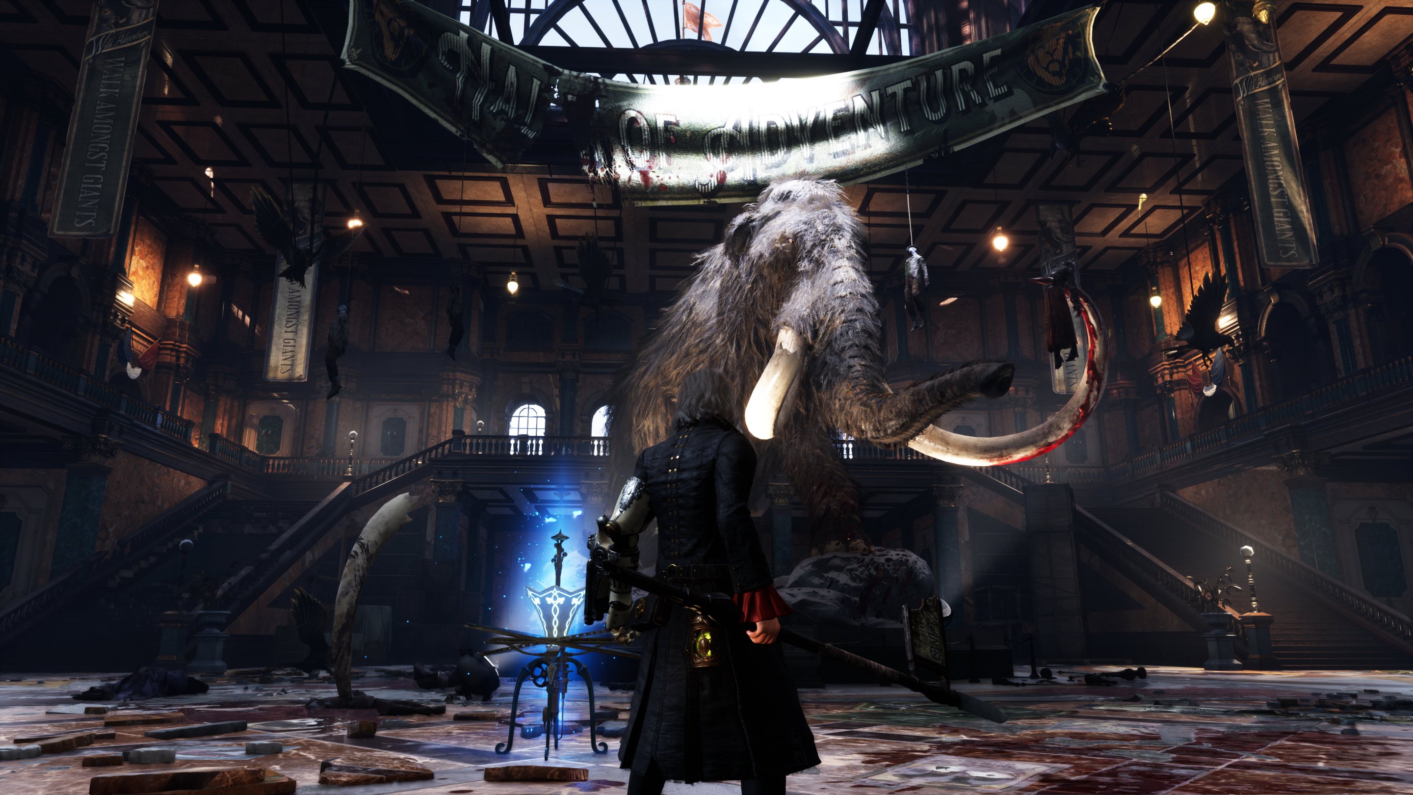 P standing in front of a big mammoth.