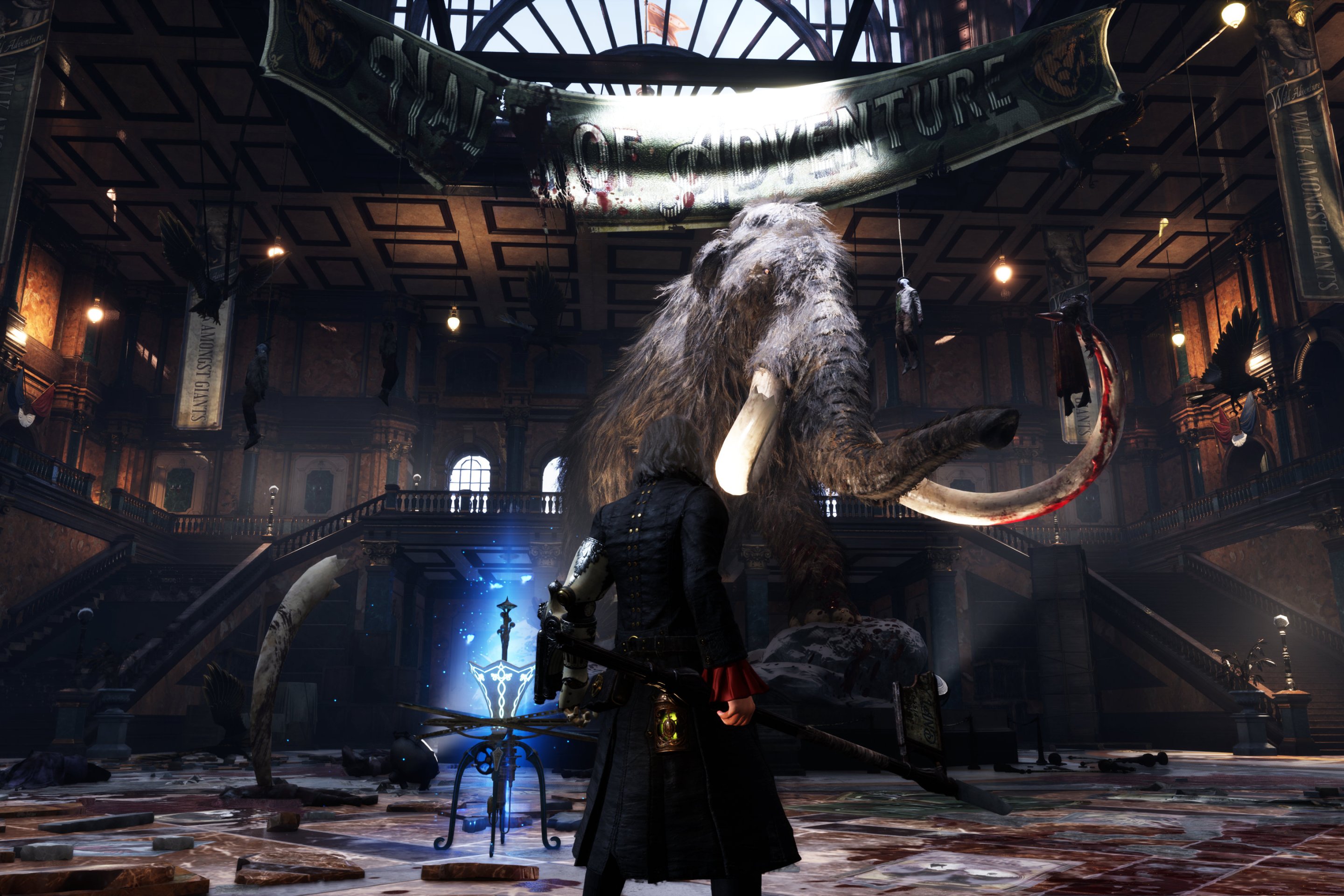P standing in front of a big mammoth.