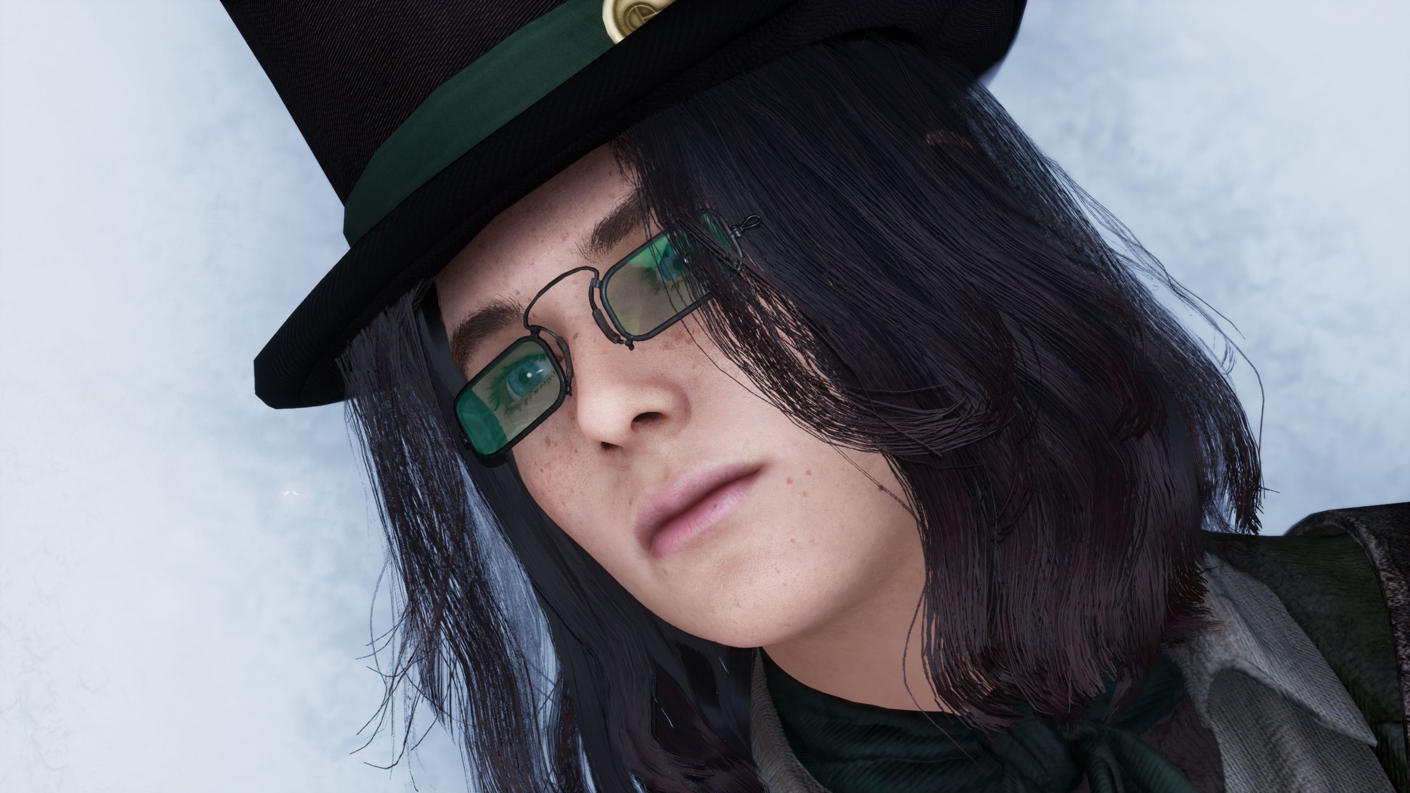 P in the snow, wearing green sunglasses and a top hat with long hair.