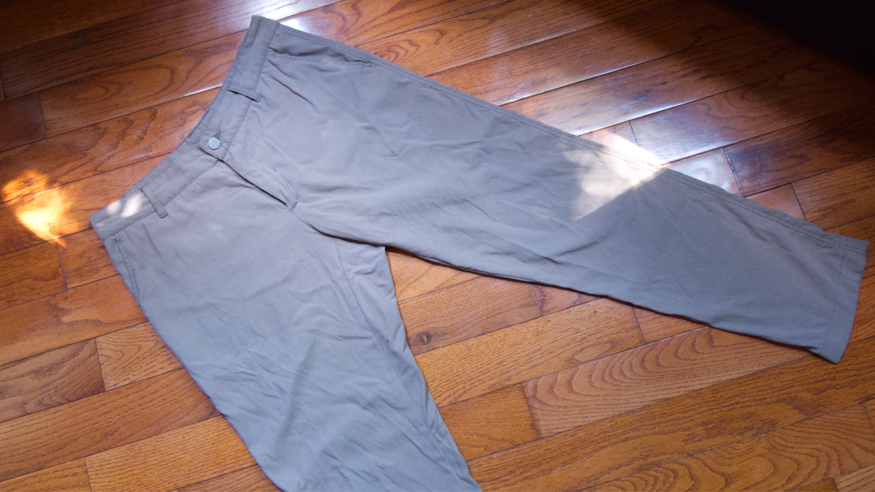 A pair of Outlier futureworks pants in Dusk Olive.