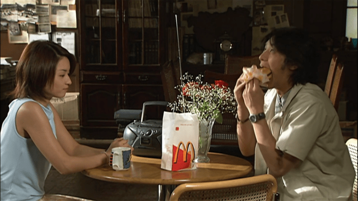Kamen Rider Kuuga's Yusuke noshing on some McDonalds.